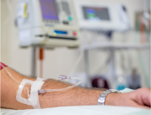 A patient receiving sublingual allergen immunotherapy drops under the tongue